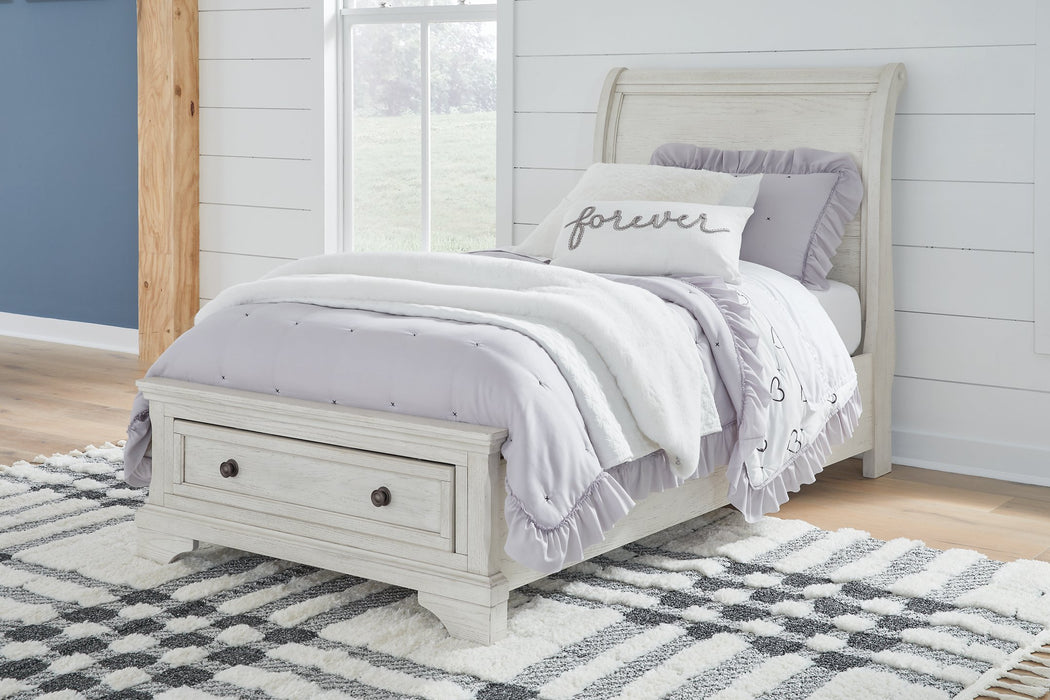 Robbinsdale Sleigh Storage Bed - Affordable Home Luxury