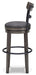 Caitbrook Bar Height Bar Stool - Affordable Home Luxury