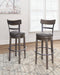 Caitbrook Bar Height Bar Stool - Affordable Home Luxury