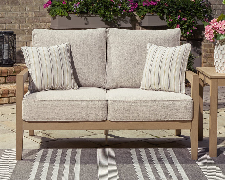 Hallow Creek Outdoor Loveseat with Cushion - Affordable Home Luxury